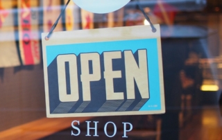 Image of an Open Sign on a Retail Shop Window